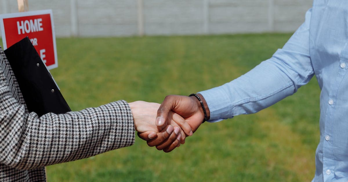 Letting agent reviewing landlord portfolio on screen
